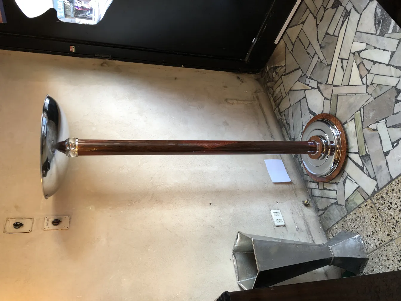 Two antique floor lamps with elegant design, decorating a cozy and warm setting.