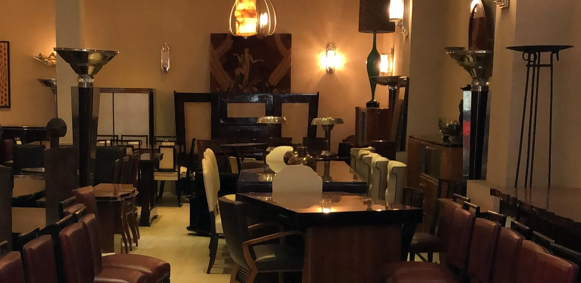 two antique floor lamps in an elegant setting, decorative and functional