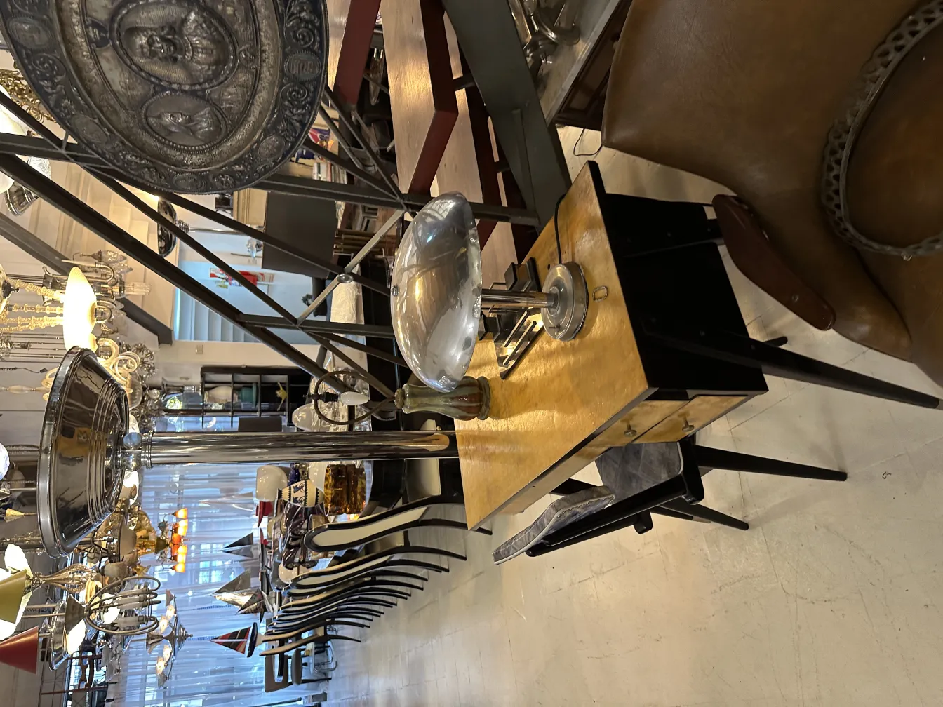 two antique floor lamps in a stylish setting