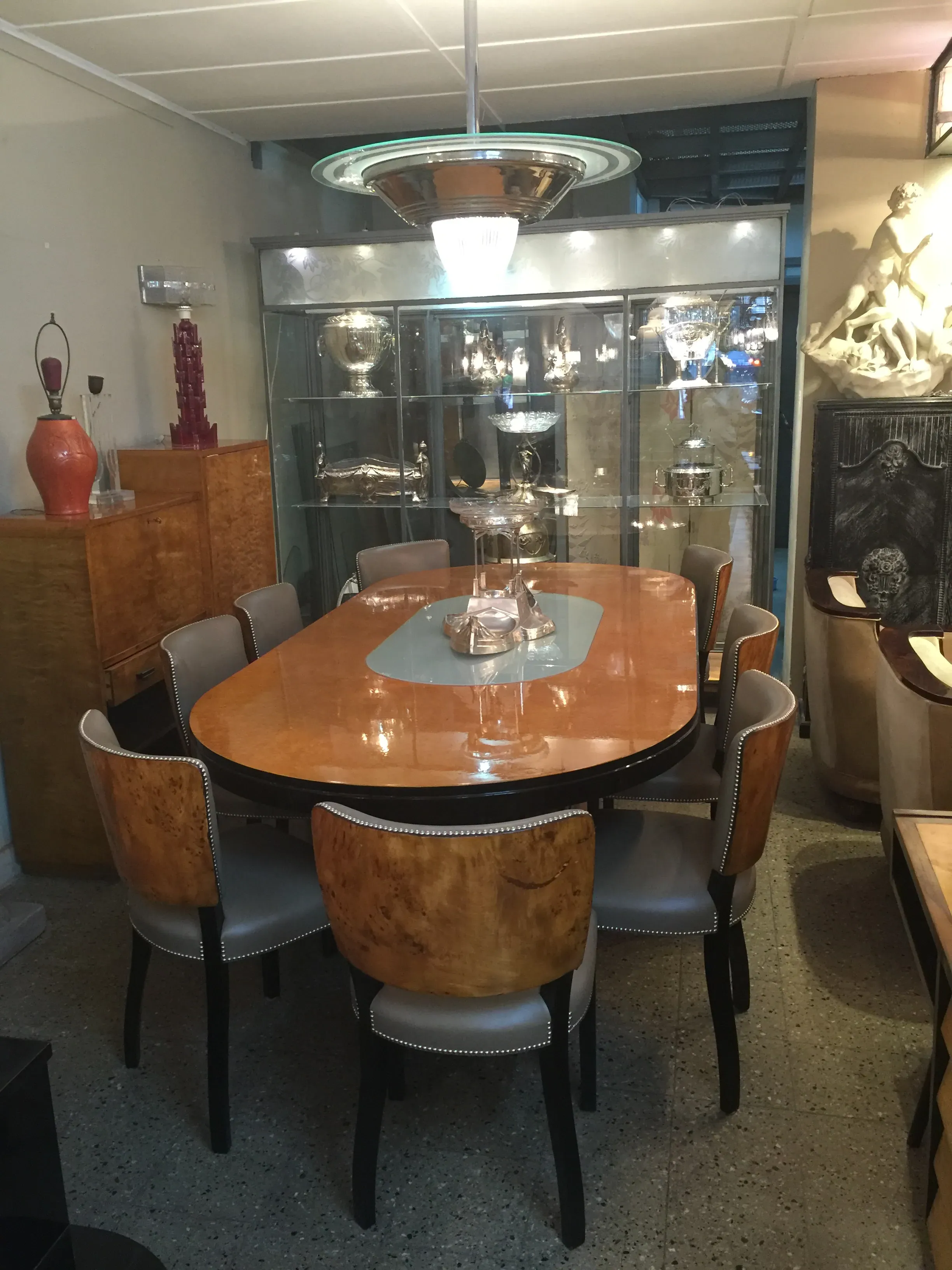 Antique dining table with light for ten people, Art Deco style.
