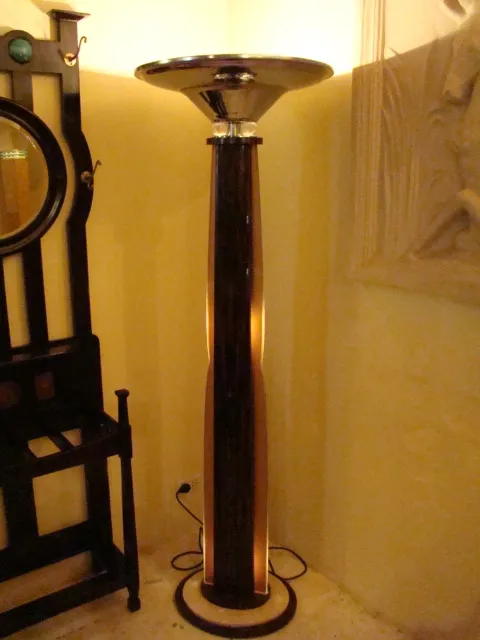 Two antique floor lamps with warm light in a cozy setting.