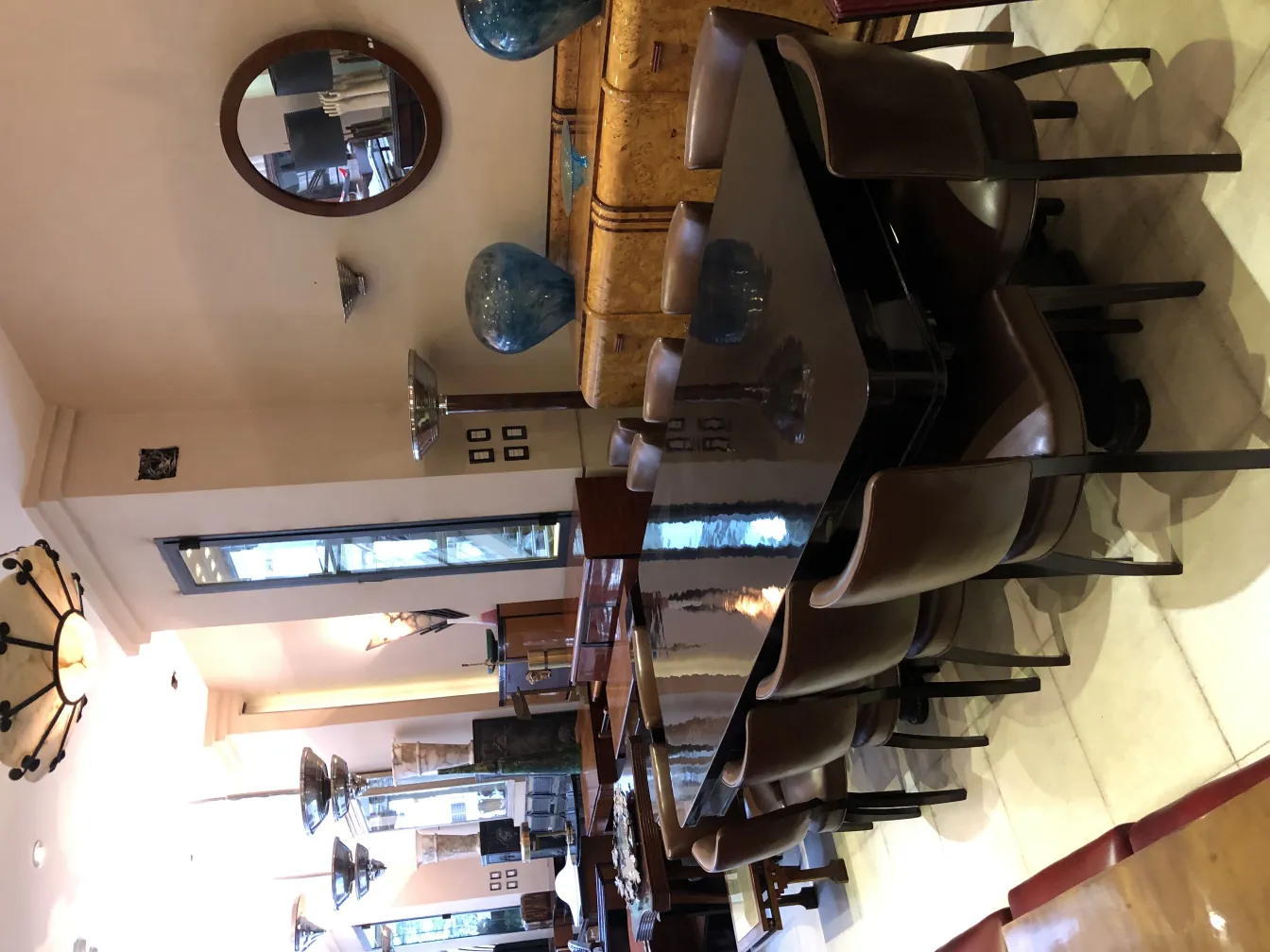 two antique floor lamps in a modern decorated space