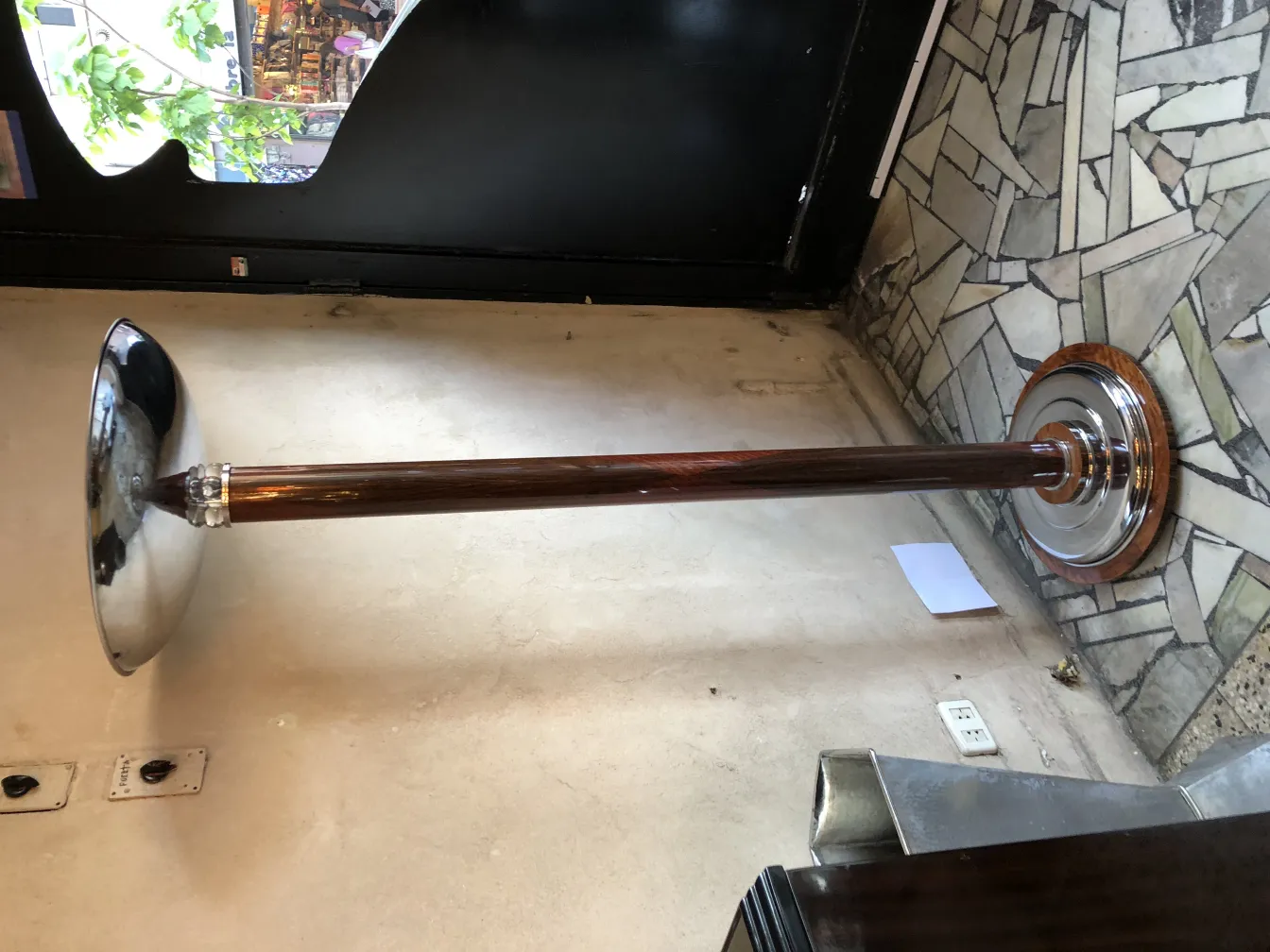 two antique floor lamps with classic design in a cozy setting