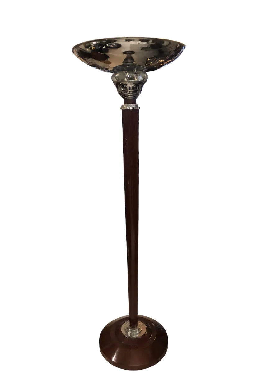 Two antique floor lamps with an elegant bowl-shaped design.