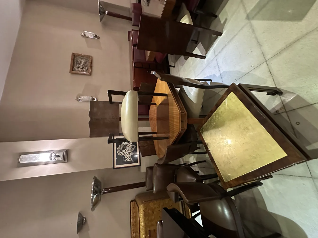 two antique floor lamps in a cozy setting