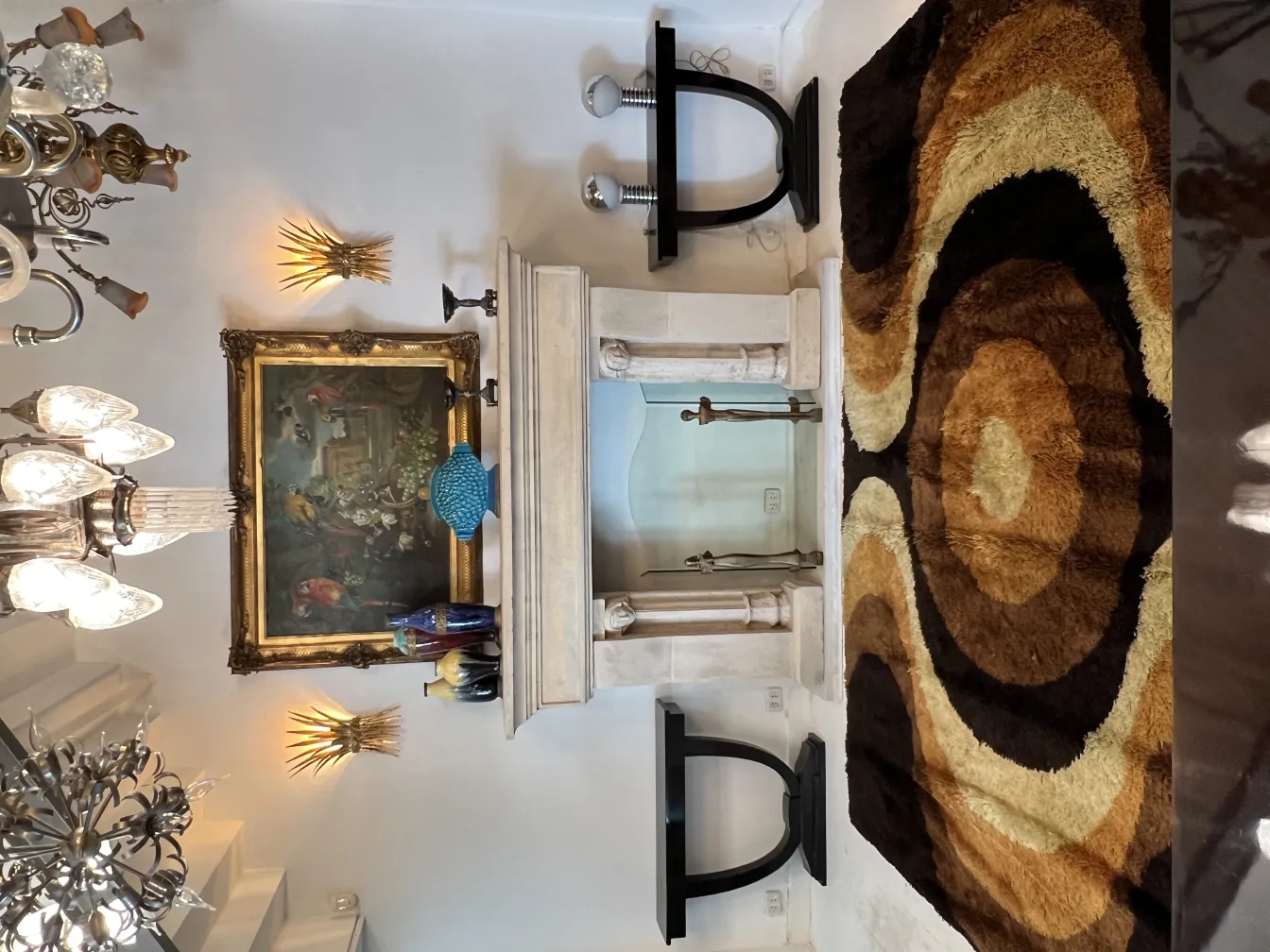 antique carpet with circular patterns in brown tones