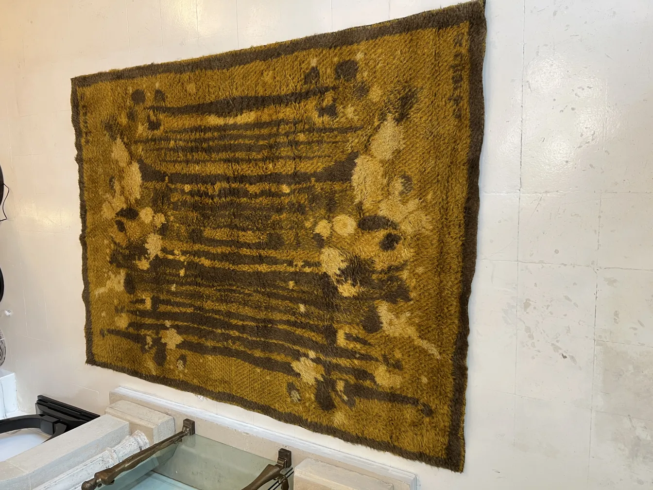 antique carpet in brown and beige tones, decorative