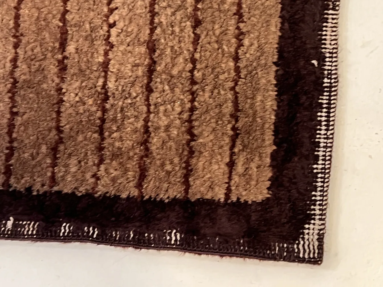 Stunning antique carpet in shades of beige and brown with stripes