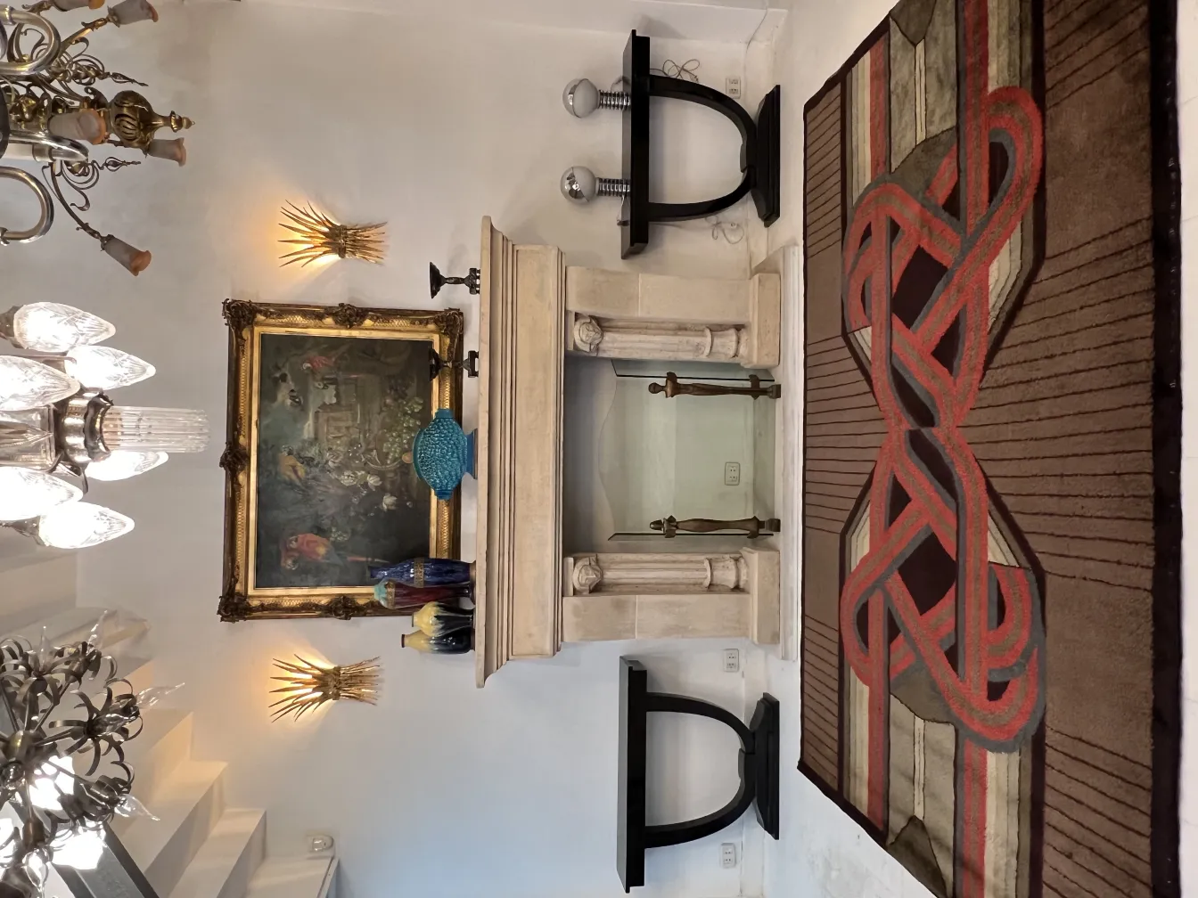 antique carpet with geometric design in an elegant setting