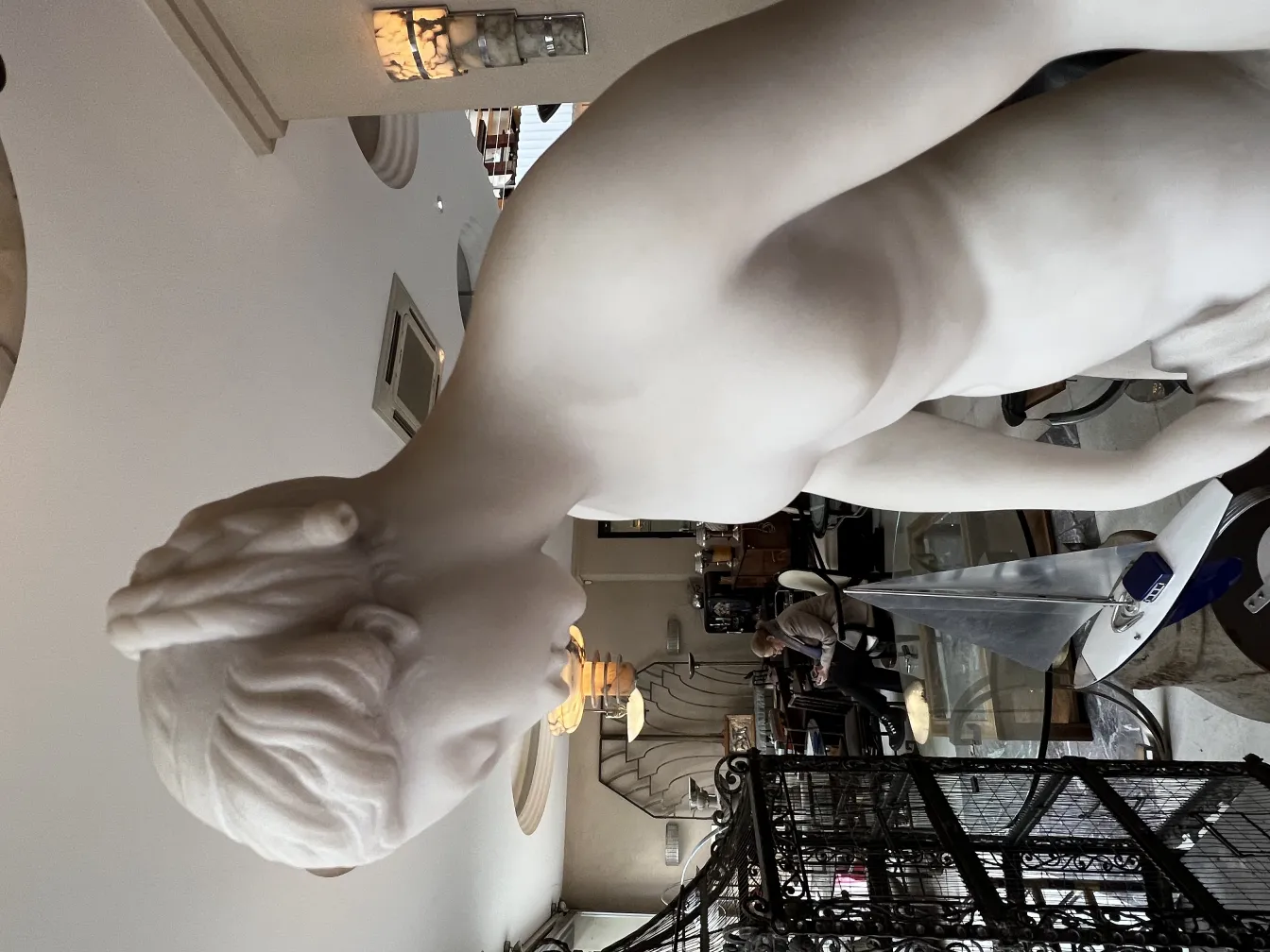 antique fountain sculpture in Art Nouveau style, elegant setting