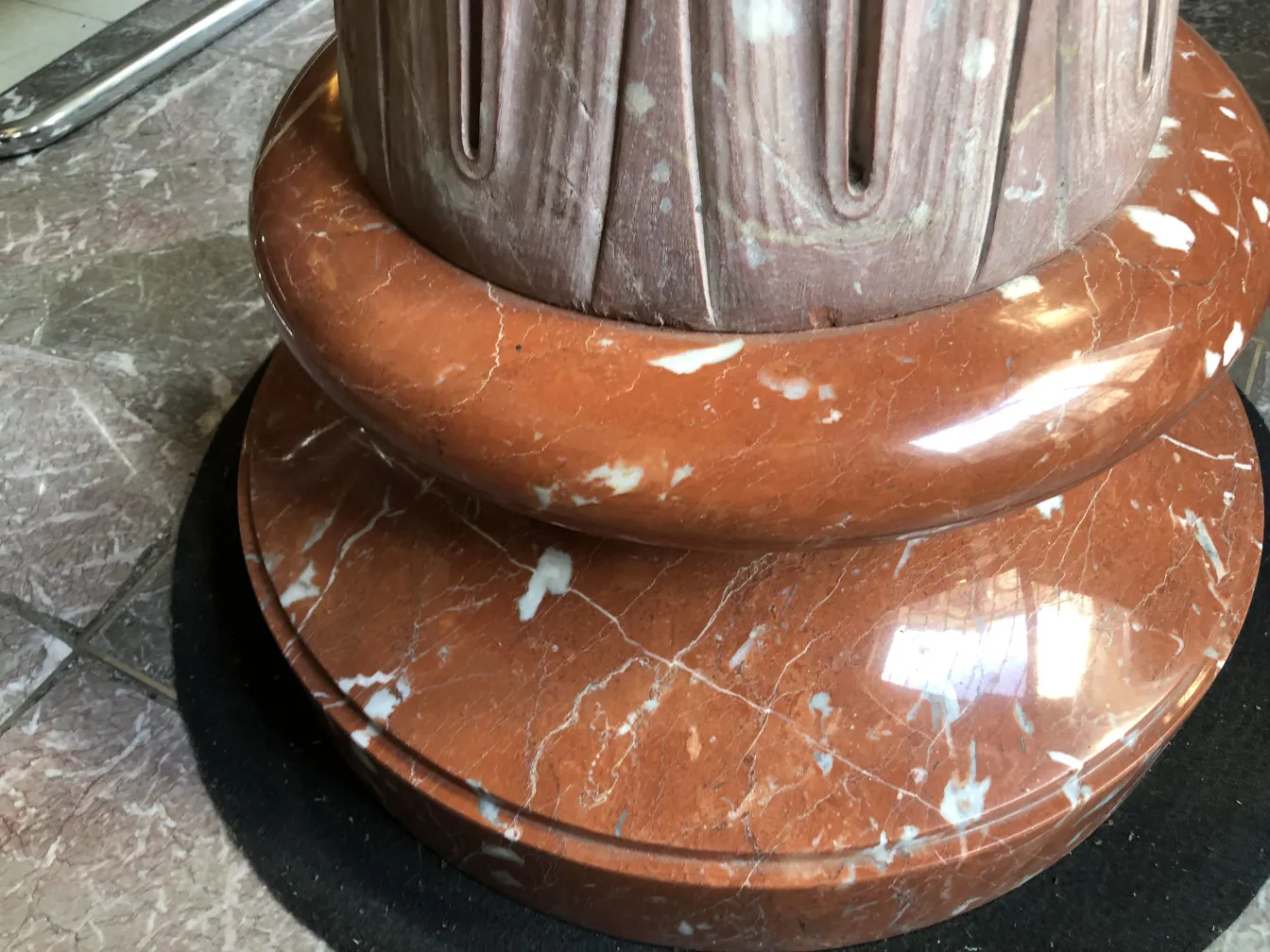 antique decorative fountain with art nouveau design, round base and carved details