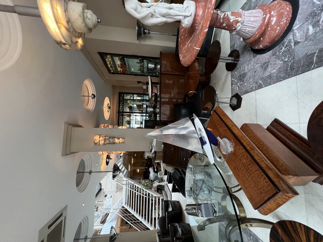 antique decorative fountain in Art Nouveau style within an elegant setting.