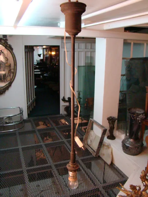 two antique hanging lamps in a cozy environment