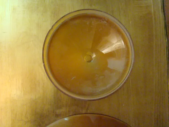 top view of two antique hanging lamps in amber color