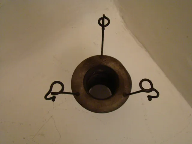 Top view of two antique decorative hanging lamps with hooks.