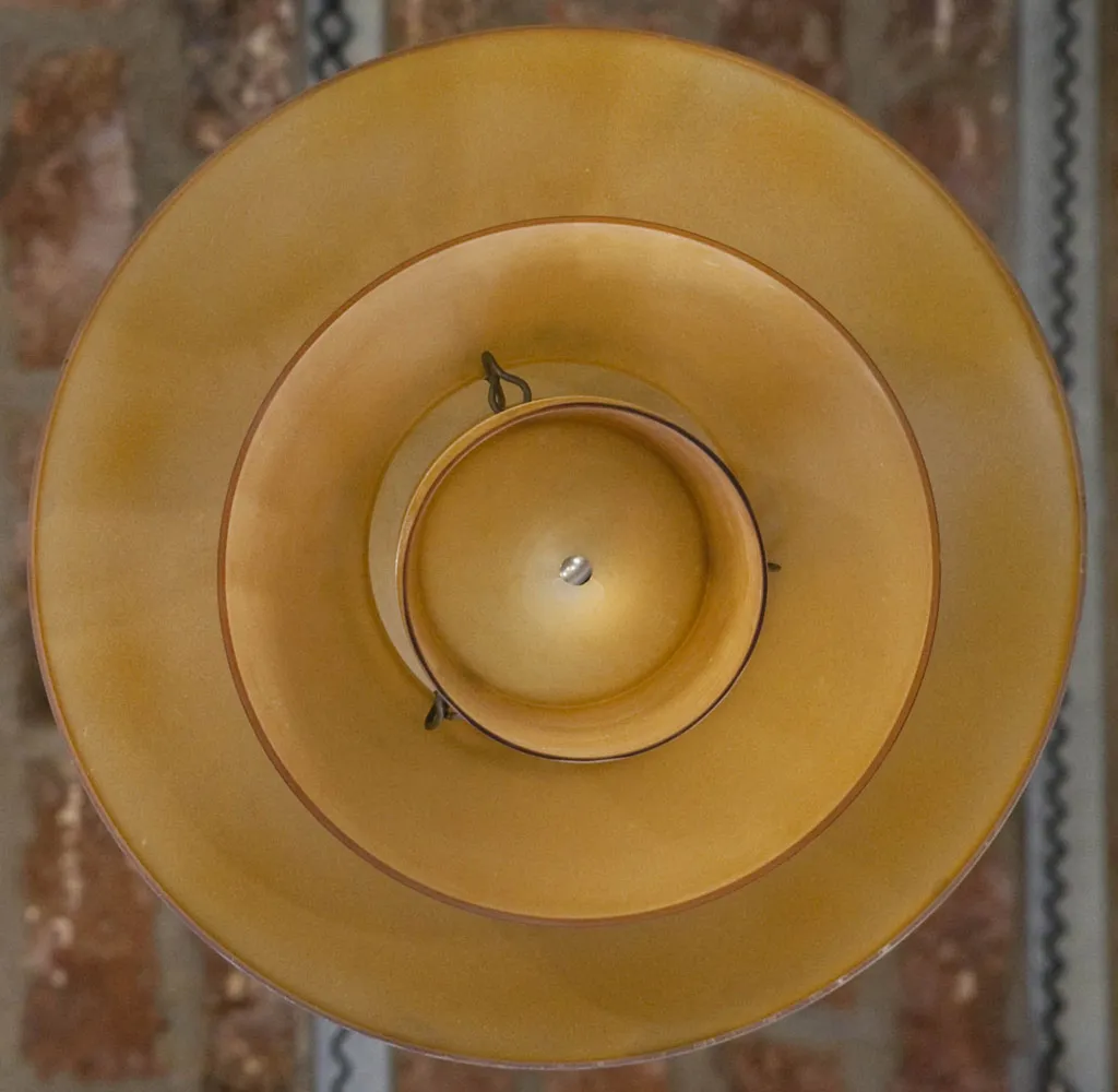 top view of 2 antique hanging lamps in golden colors