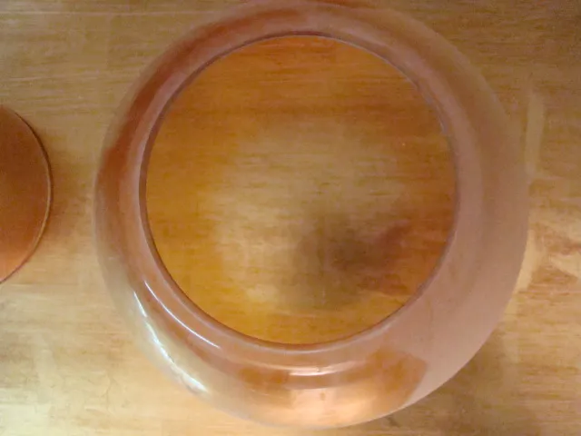 Top view of two antique hanging lamps, warm setting.