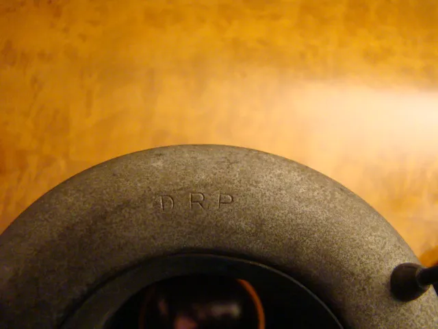 Top view of 2 antique hanging lamps in a warm environment