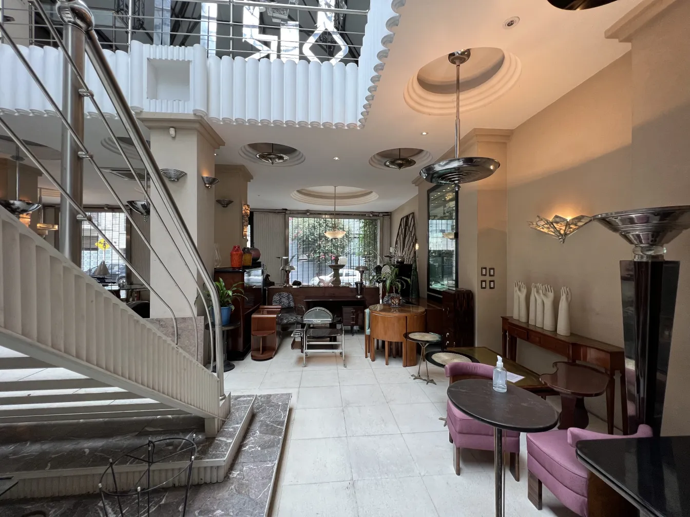 Two antique hanging lamps with striking design in a cozy and elegant environment.