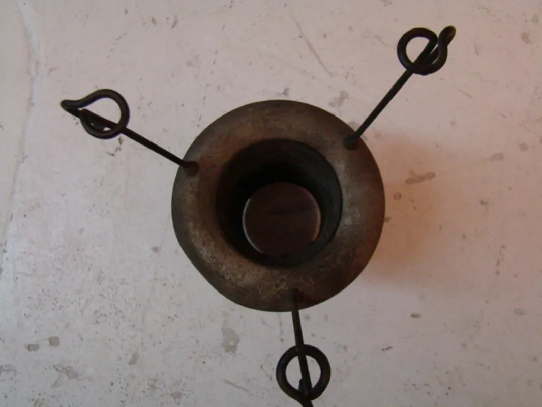 Top view of two vintage hanging lamps with metal hooks