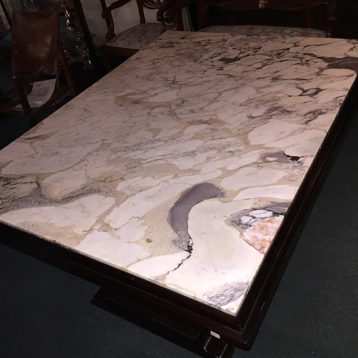 antique dining table for 6 with Art Deco design in an elegant setting