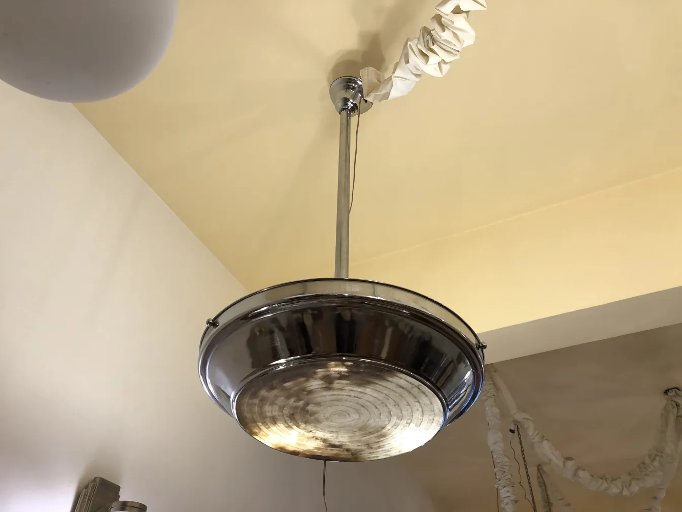 Antique lighting featuring 2 hanging lamps, decorative, warm ambiance.