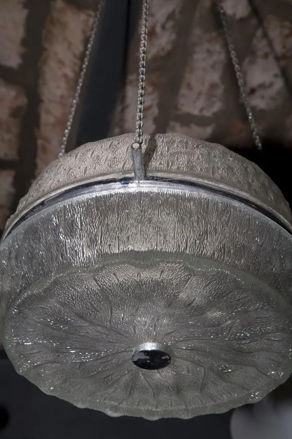 Two antique hanging lamps with flower design, cozy atmosphere