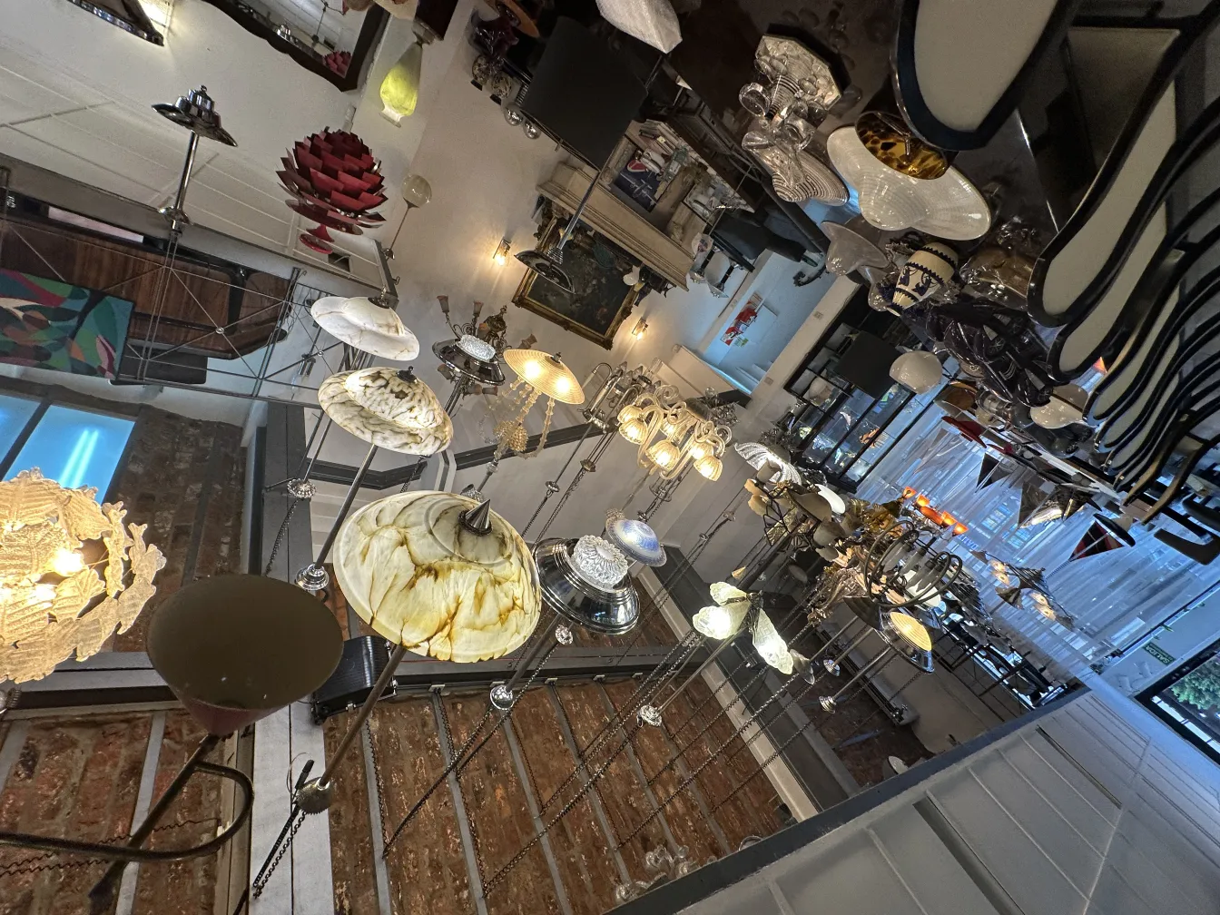 Two antique hanging lamps, soft light and decorative design, in a cozy environment.