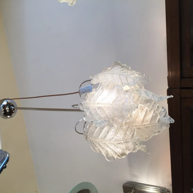 2 antique hanging lamps with elegant design, illuminating a cozy environment