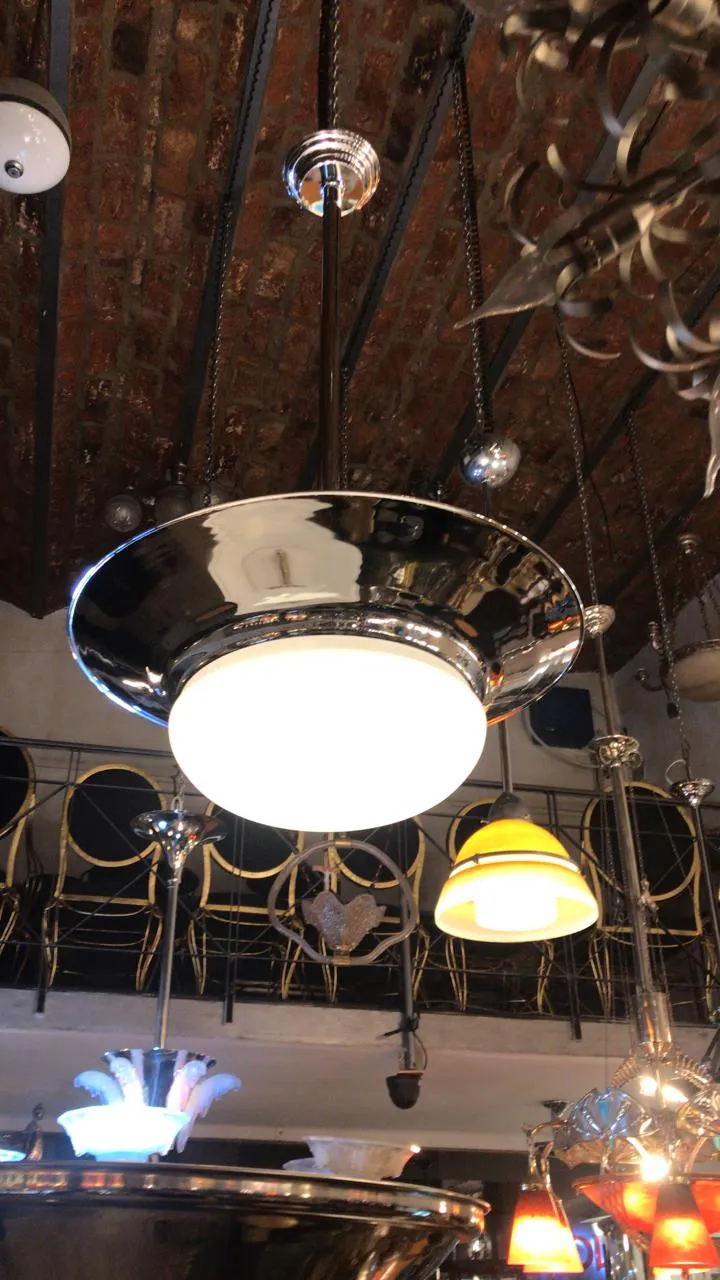 Two elegant antique hanging lamps in a cozy setting