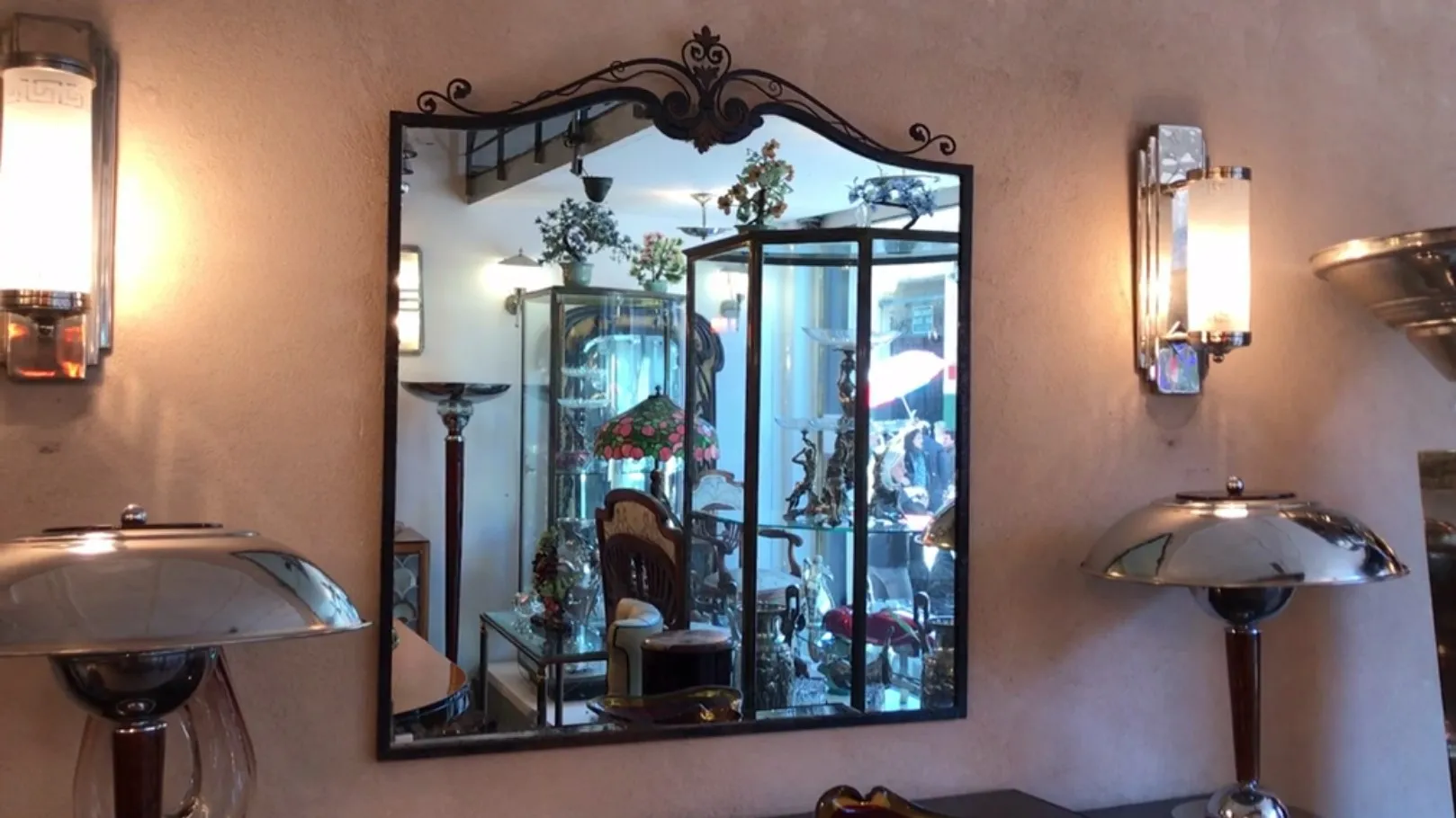 antique decorative mirror against a lit background