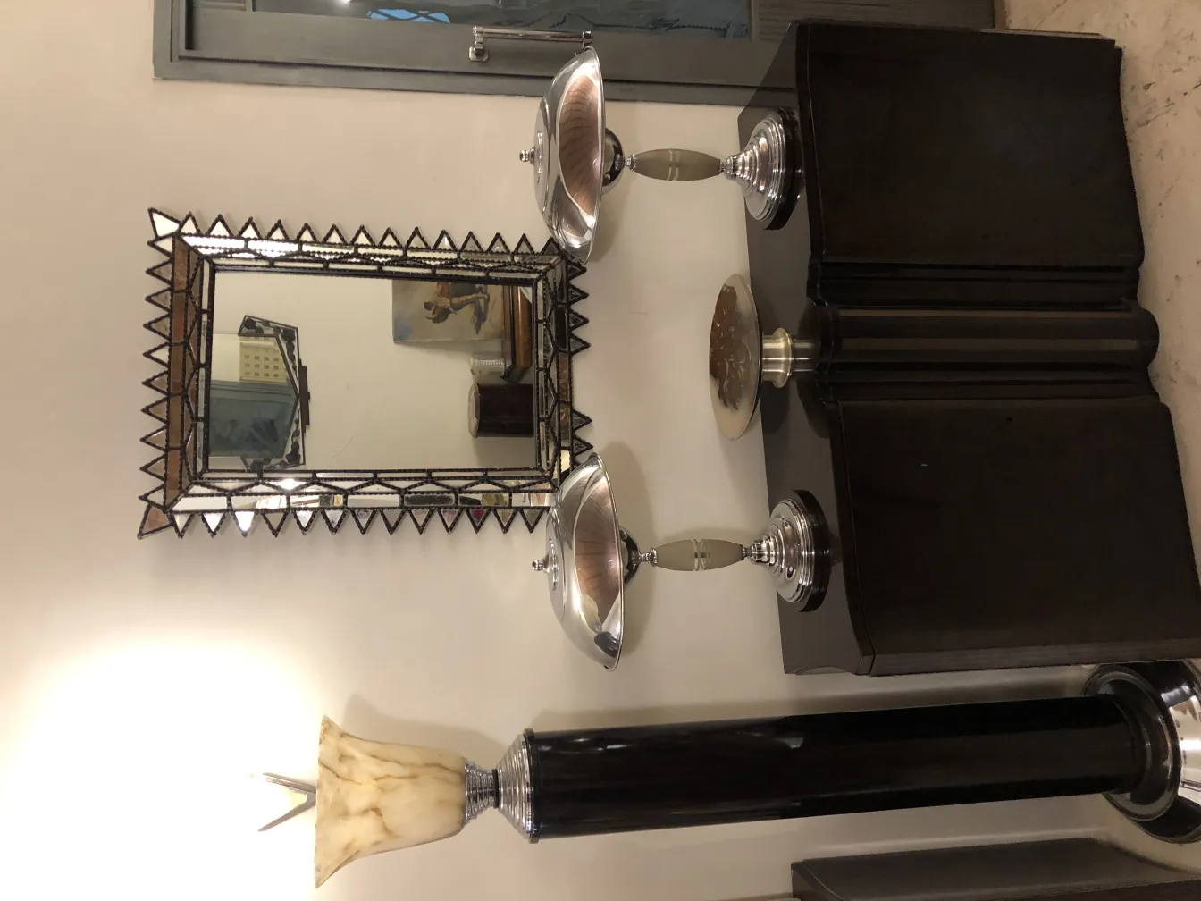 antique mirror with zigzag frame and details