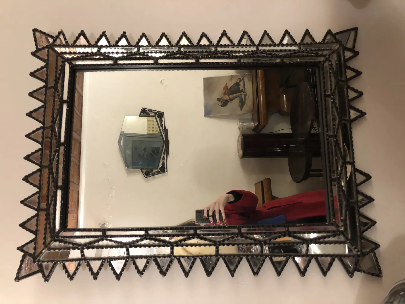 antique decorative mirror with a beveled frame in a soft ambiance