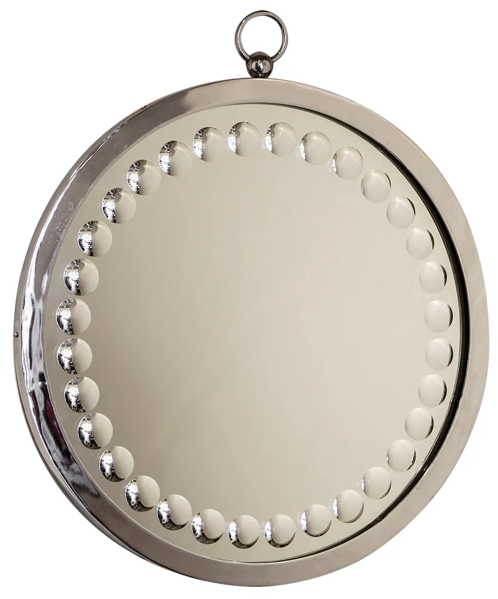 miroir antique avec des bords biseautés et des détails sphériques.