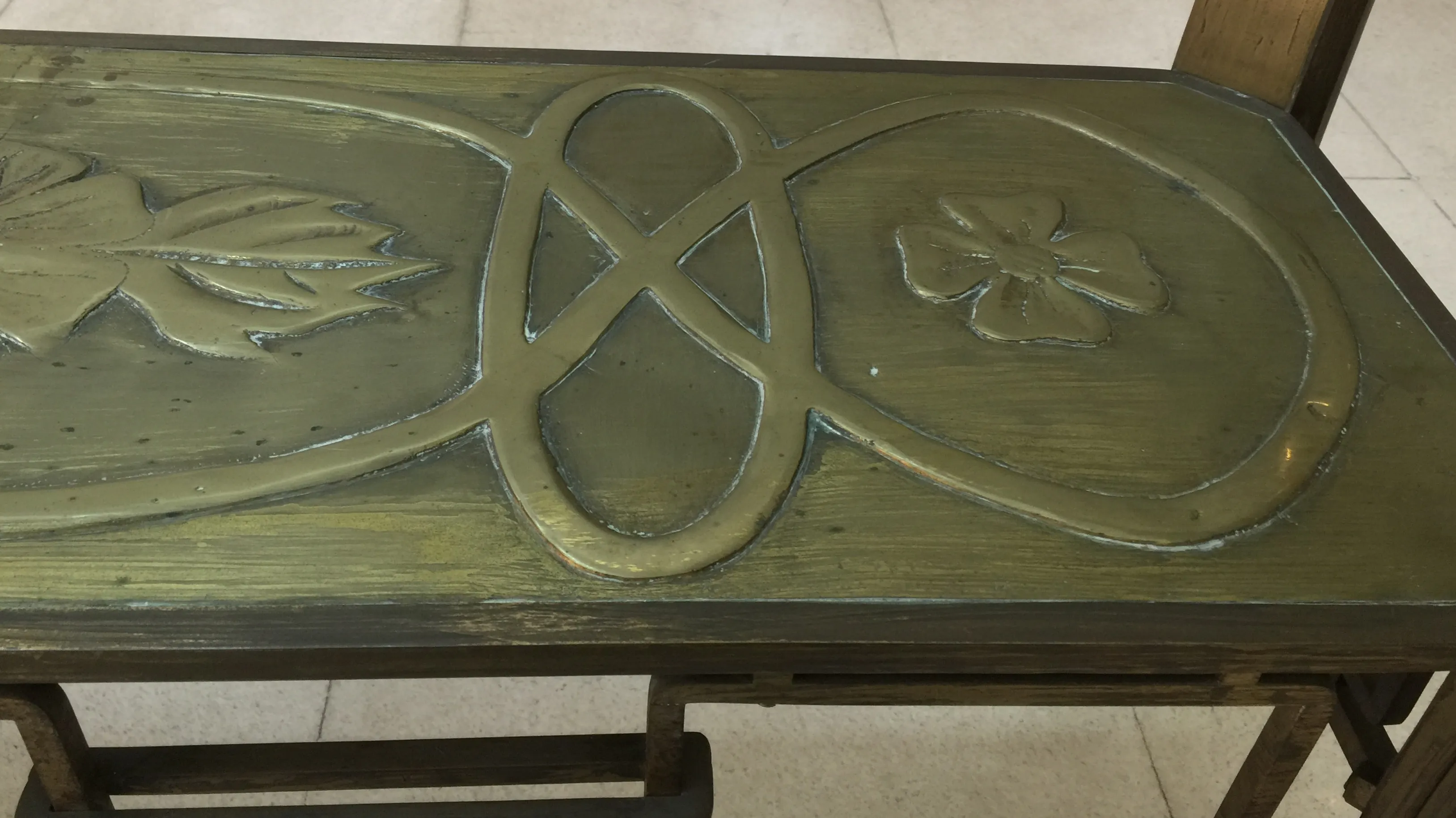 antique dining table with floral design, suitable for 10 people