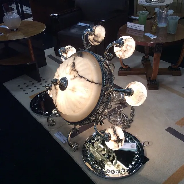 antique decorative mirror with elegant details and round shape