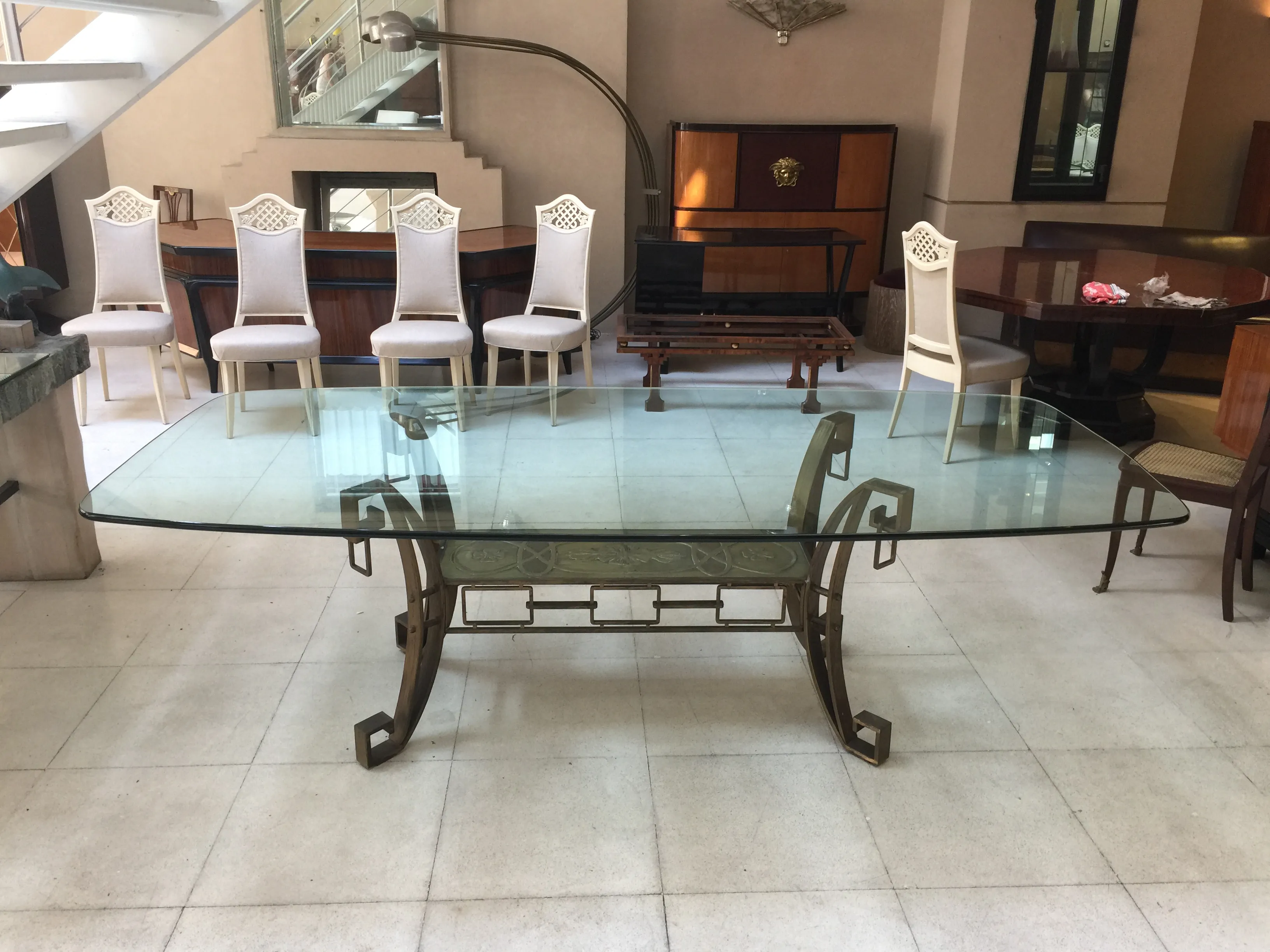 Antique dining table for 10 people with elegant soft chairs