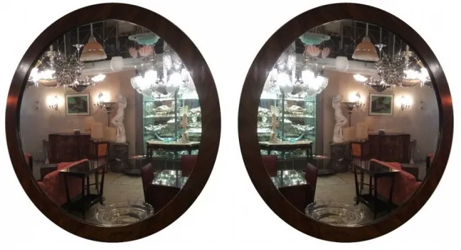 miroir rond antique dans un cadre décoratif