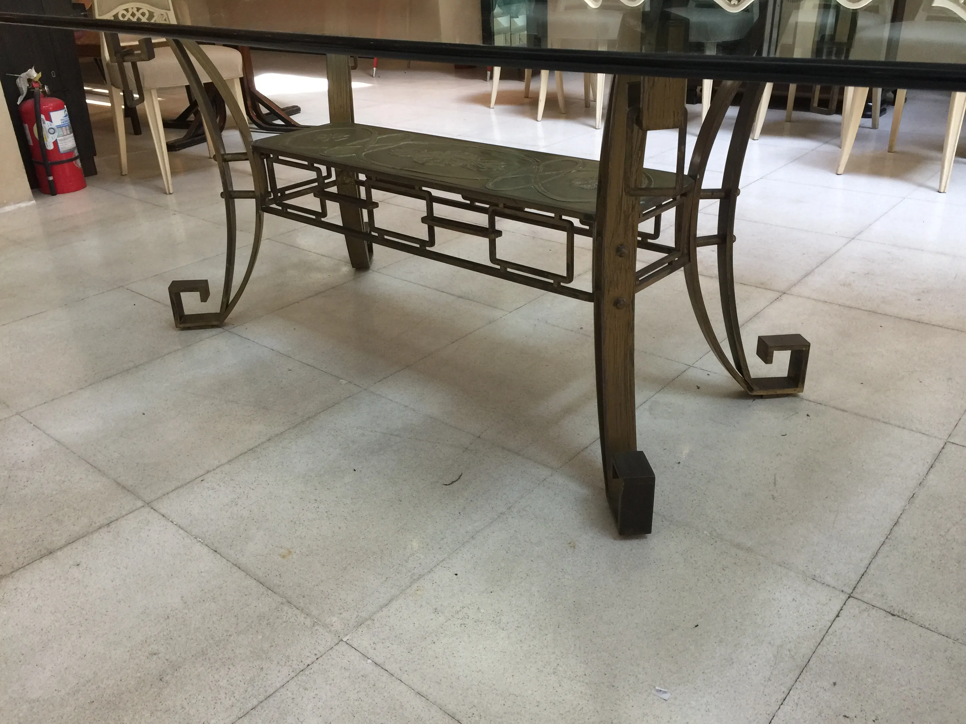 Antique dining table for 10 people in a classic setting.