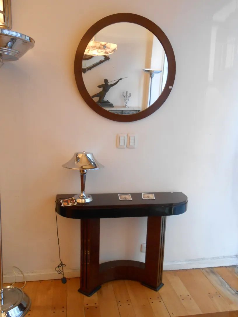 antique round mirror on wall with modern details