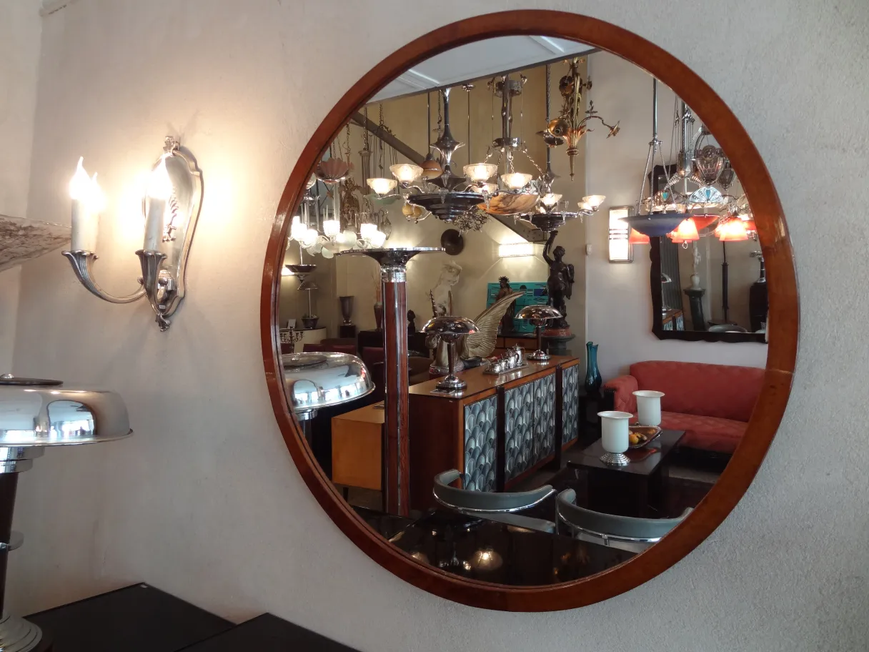 Antique round decorative mirror in a classic room