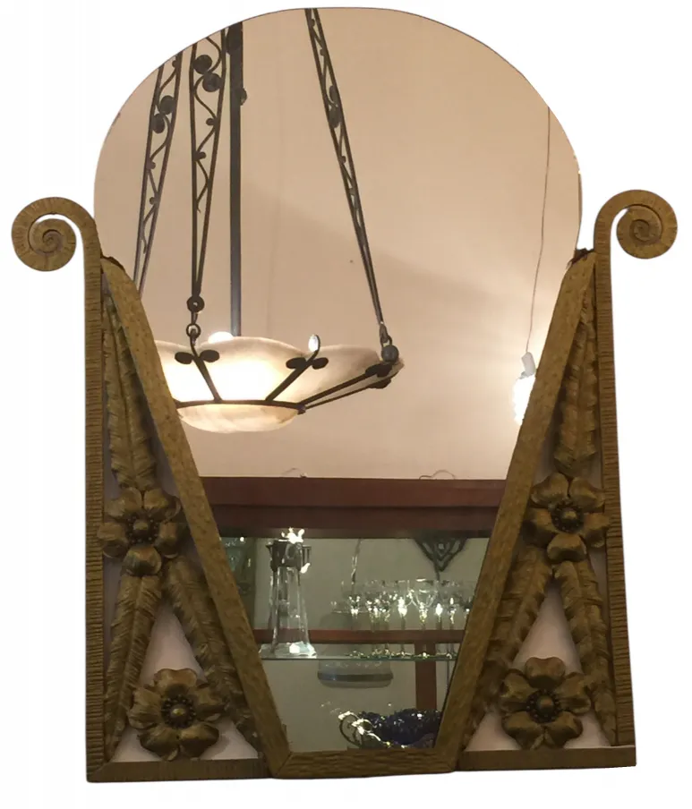 Miroir ancien ovale avec décoration florale