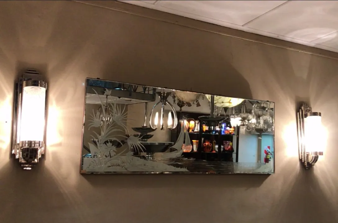 Antique decorative mirror with engraved details, framed, lit