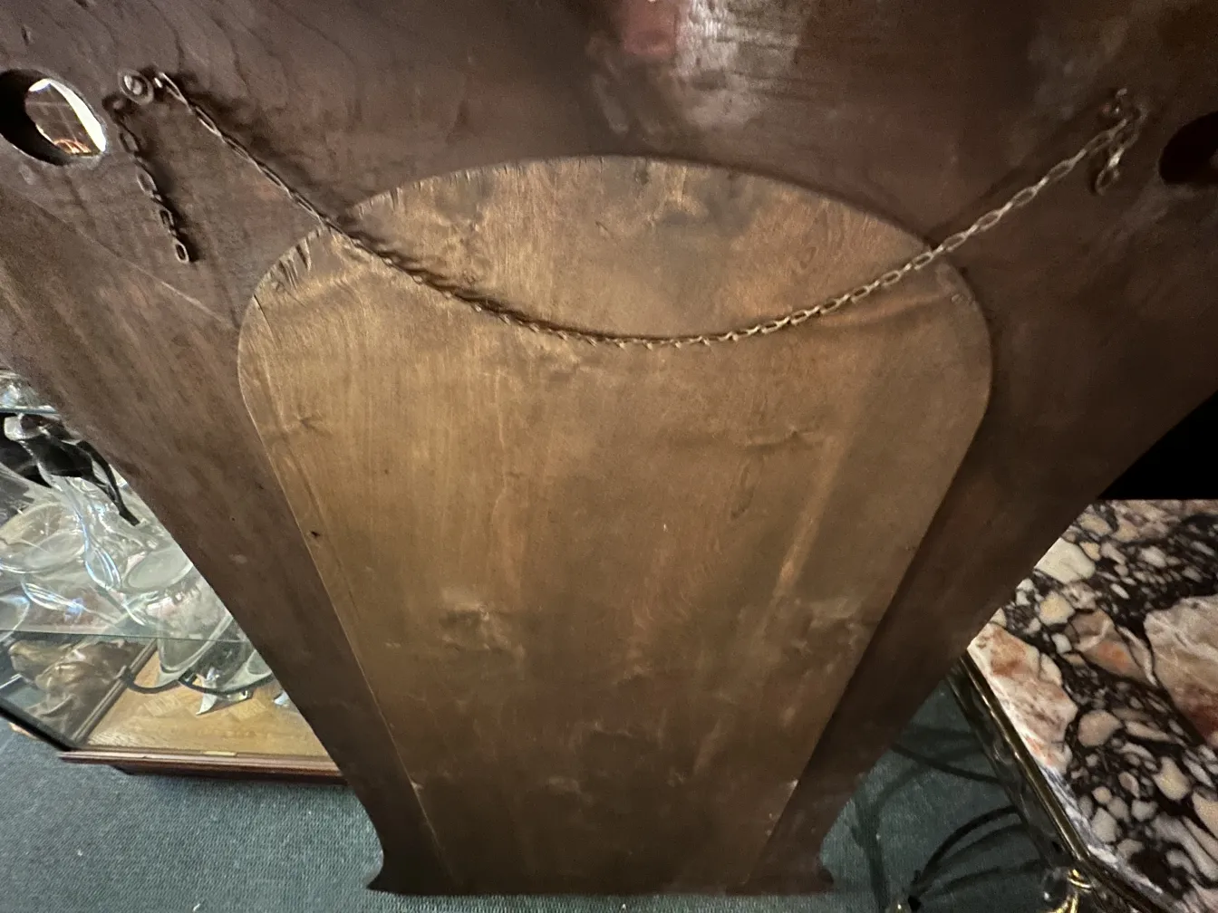 espejo antiguo decorativo con cadena en la parte trasera