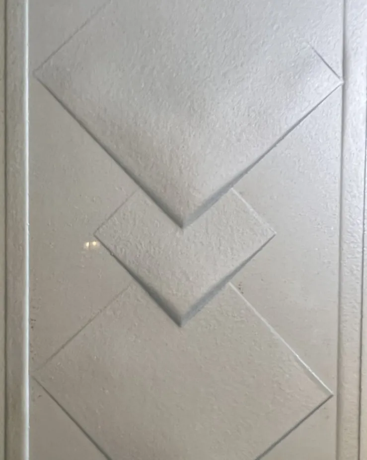 white antique mirror with textured diamond pattern