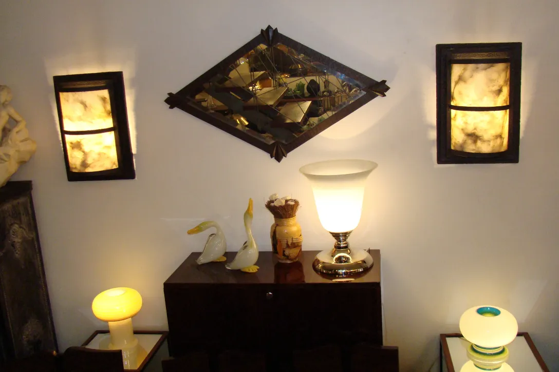 antique diamond-shaped mirror with lights