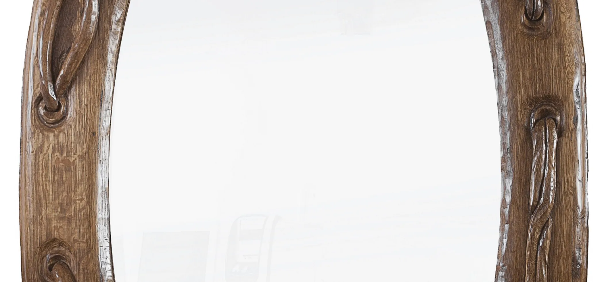 miroir antique avec bord arrondi et détails subtils