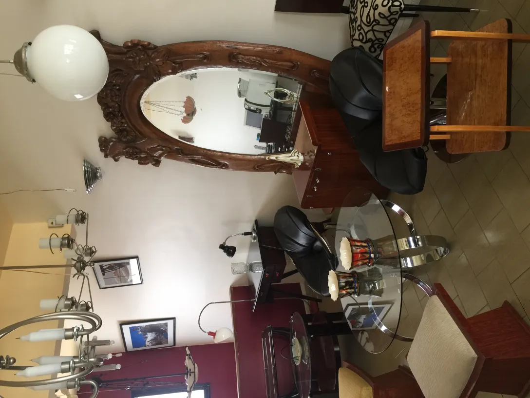 antique mirror with ornate frame in classic setting