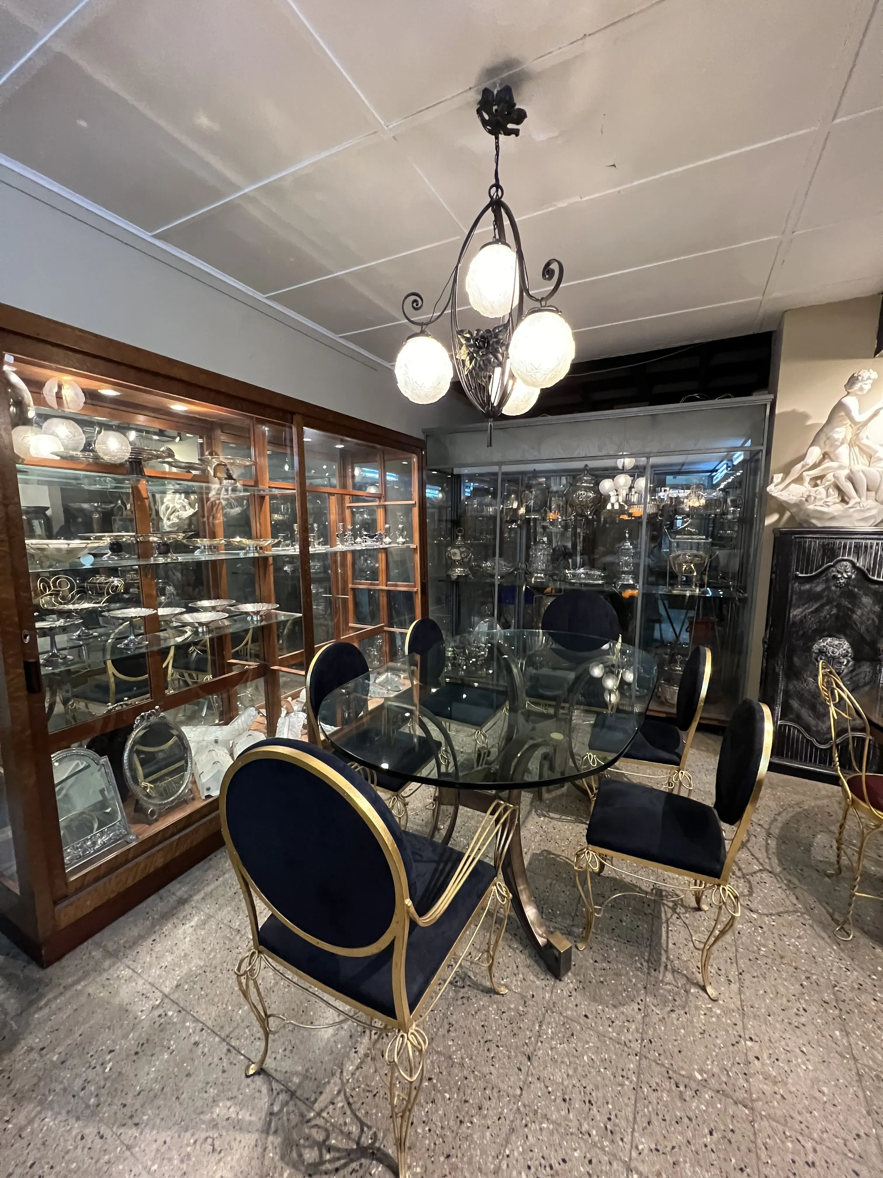 Antique dining table for 6 with elegant chairs.