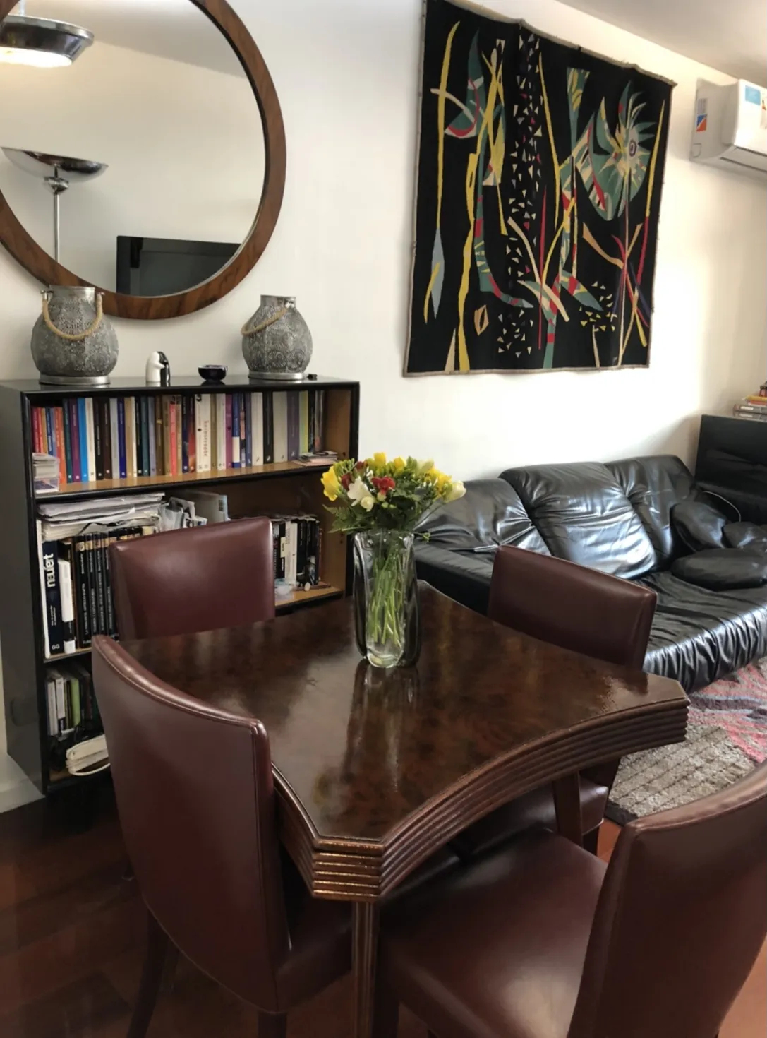 antique dining table for 4 people with flowers